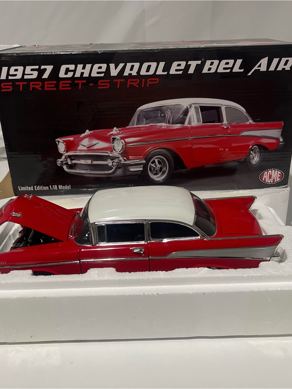 ACME 1957 Chevrolet Bel Air Model Car in Red and Silver
